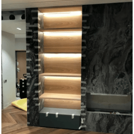 Встроенный стеллаж с подсветкой из МДФ в натуральном шпоне Ясеня. Цена за 1м2.
